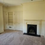 Front Bedroom Bookcase And Fireplace